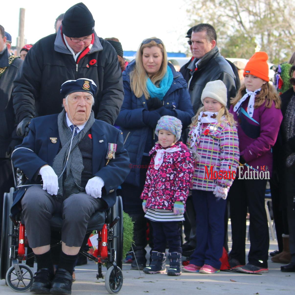 Clint Page, 93, a World War 11 veteran of the Merchant Navy was at the event and watched as his grandchildren laid the wreaths in memory of the fallen heroes.